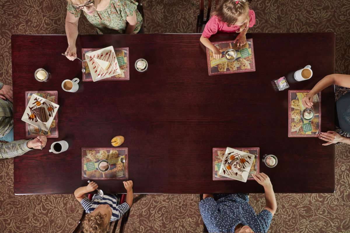 overhead view of family eating at Old Spaghetti Factory