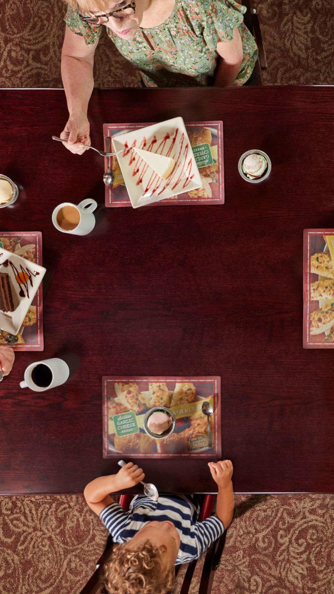 overhead view of family eating at Old Spaghetti Factory