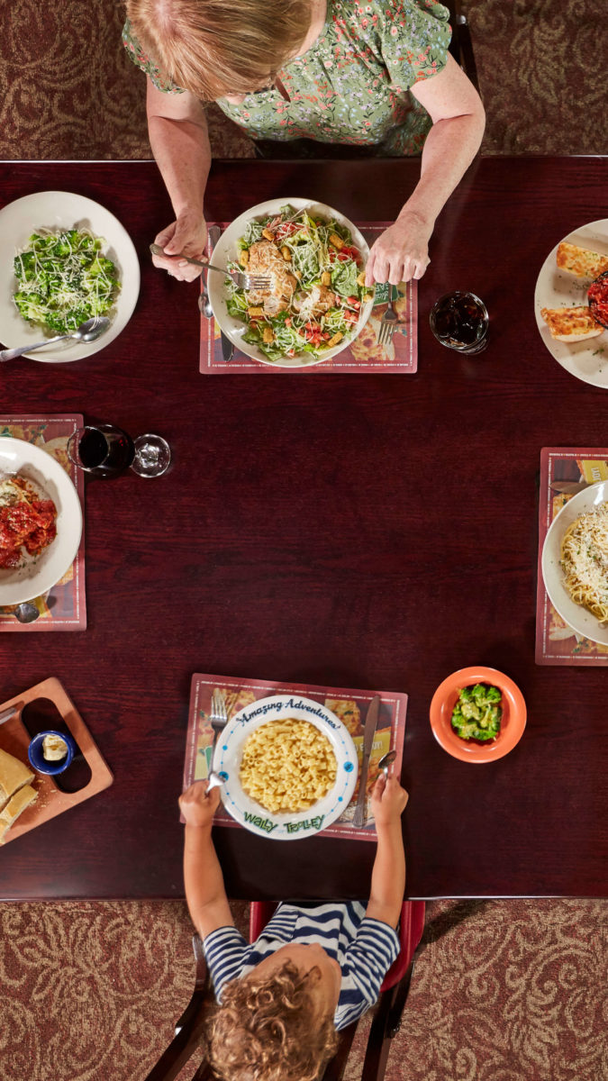 overhead view of family eating at Old Spaghetti Factory