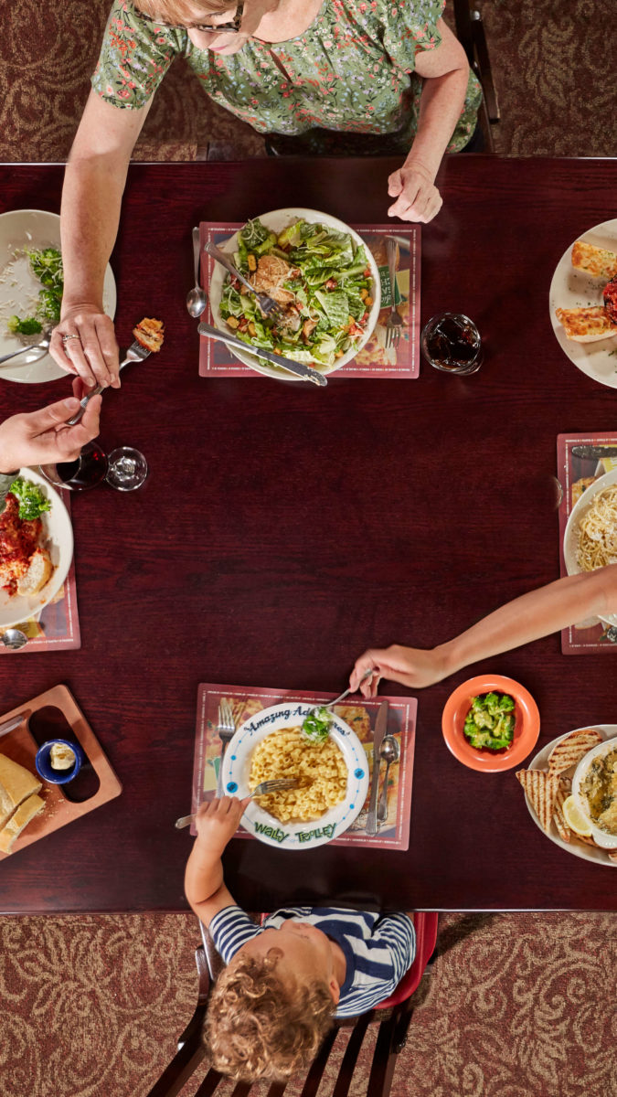 overhead view of family eating at Old Spaghetti Factory