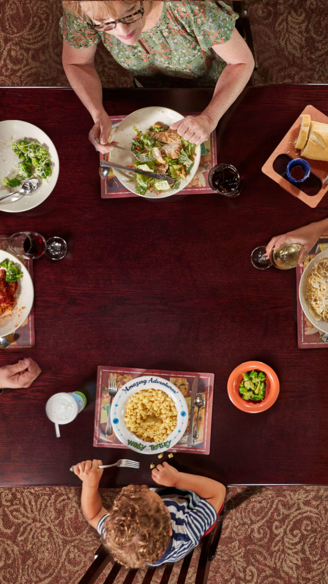 overhead view of family eating at Old Spaghetti Factory