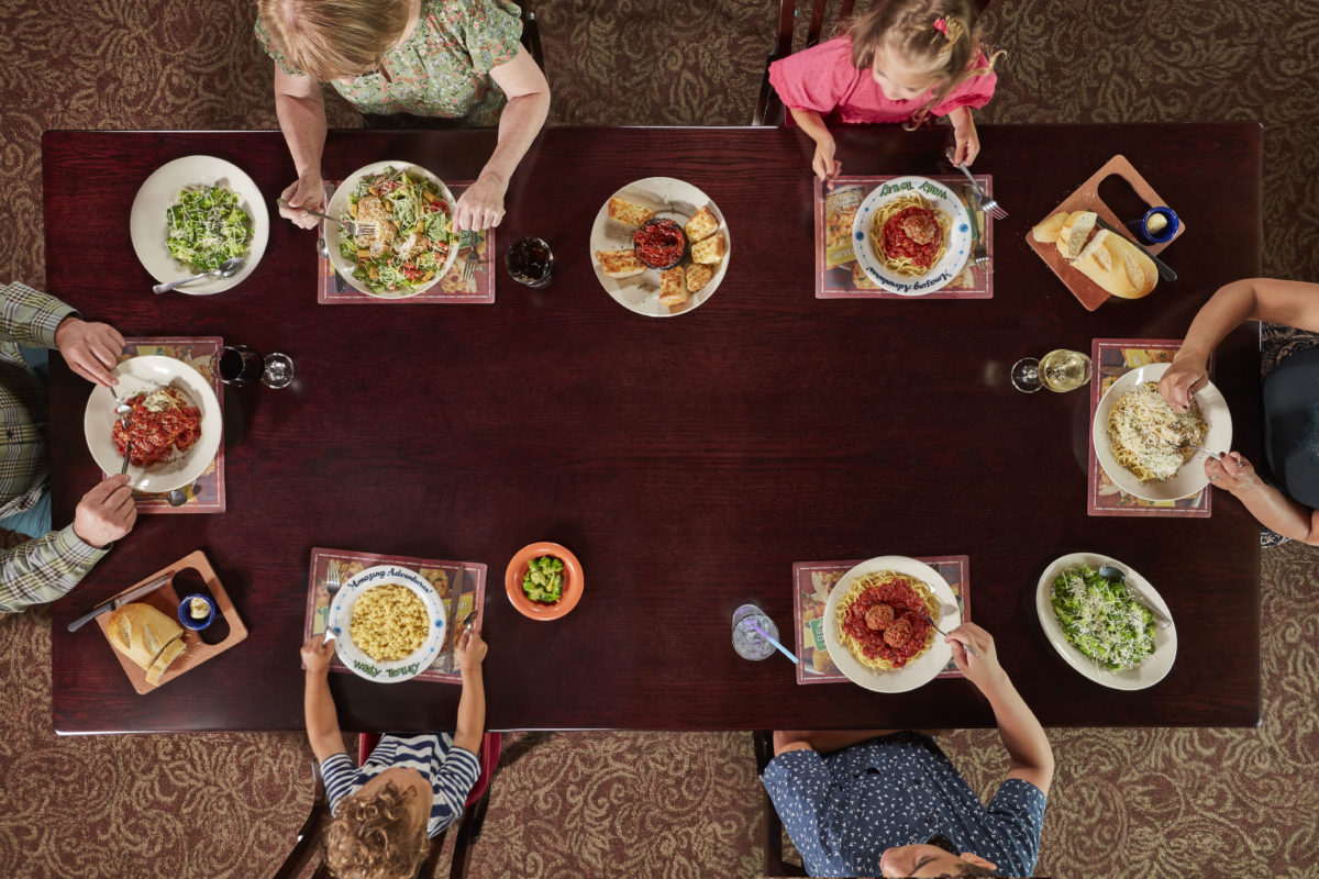 overhead view of family eating at Old Spaghetti Factory