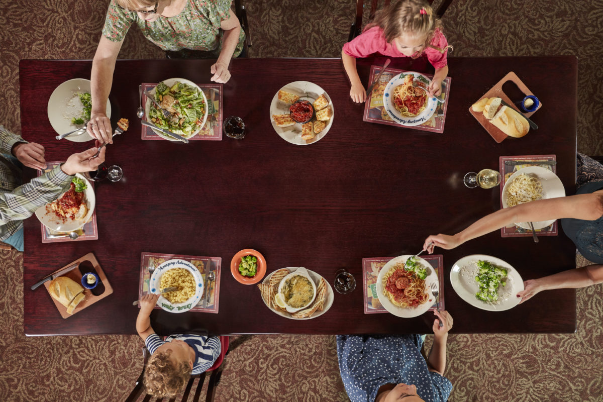 overhead view of family eating at Old Spaghetti Factory