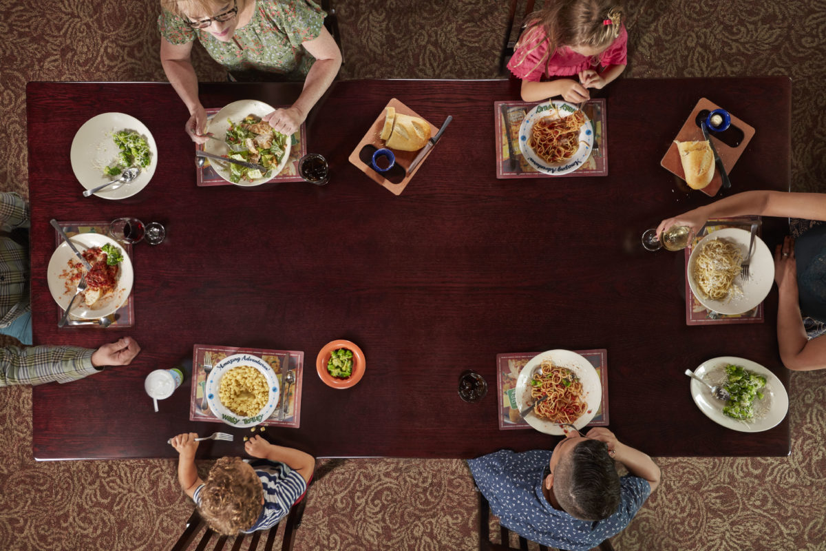 overhead view of family eating at Old Spaghetti Factory