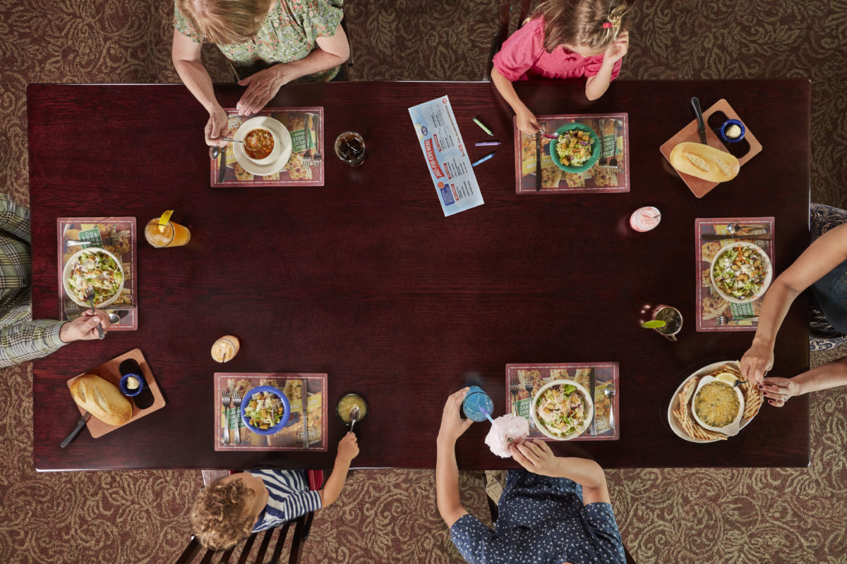 overhead view of family eating at Old Spaghetti Factory