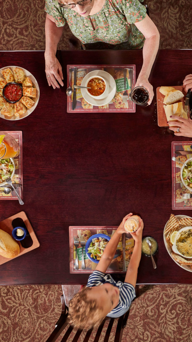 overhead view of family eating at Old Spaghetti Factory