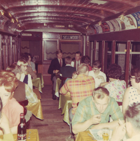 people eating in The Old Spaghetti Factory trolley